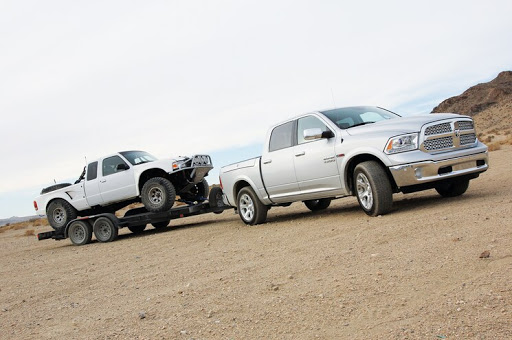 RAM 1500 towing a vehicle 