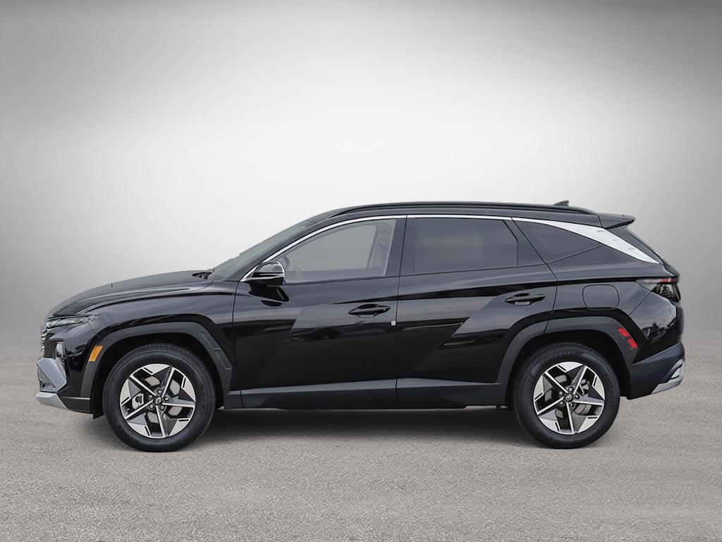 Profil latéral complet du Tucson 2026 Preferred AWD Trend. La ligne de toit est fluide.