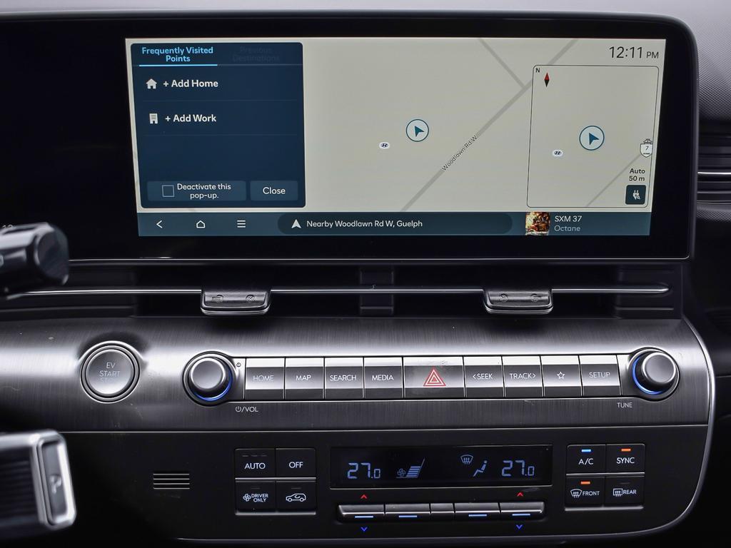 Kona EV Ultimate 2026 Intérieur, gros plan sur l'écran tactile du système de navigation de 12,3 po. Interface ccNC de nouvelle génération.
