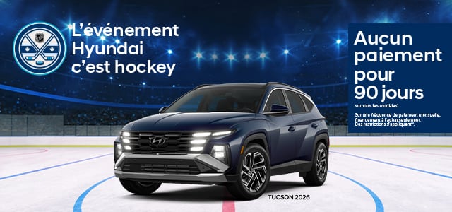 Bannière publicitaire de Hyundai Canada pour le mois de Janvier 2026. Un Tucson 2026 est stationné sur la glace d'un aréna de Hockey. Il y a un texte sur la bannière: L'événement Hyundai c'est hockey - Aucun paiement pour 90 jours sur tous les modèles^. Sur une fréquence de paiement mensuelle, financement à l'achat seulement. Des restrictions s'appliquent^^.
