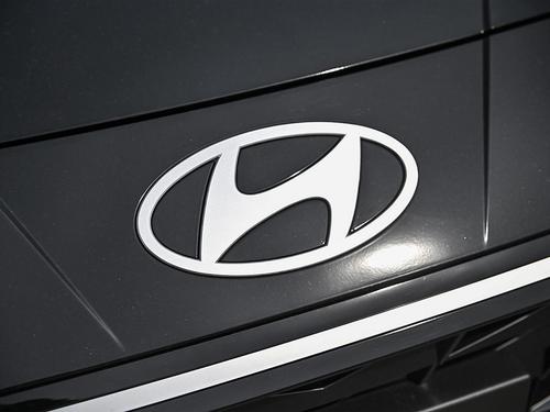 Hyundai logo on black hood