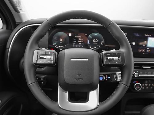 Gros plan sur le volant gainé de cuir chauffant du Hyundai Palisade Hybride 2026 Luxury avec commandes intégrées, confort indispensable pour les hivers québécois