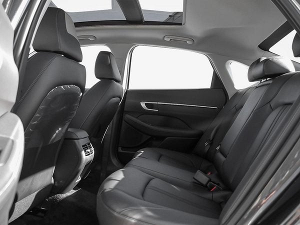 Black leather rear seats of the 2026 Hyundai Sonata Hybrid — generous passenger space.
