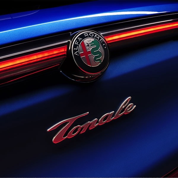 Alfa Romeo Tonale tail lights and logo.